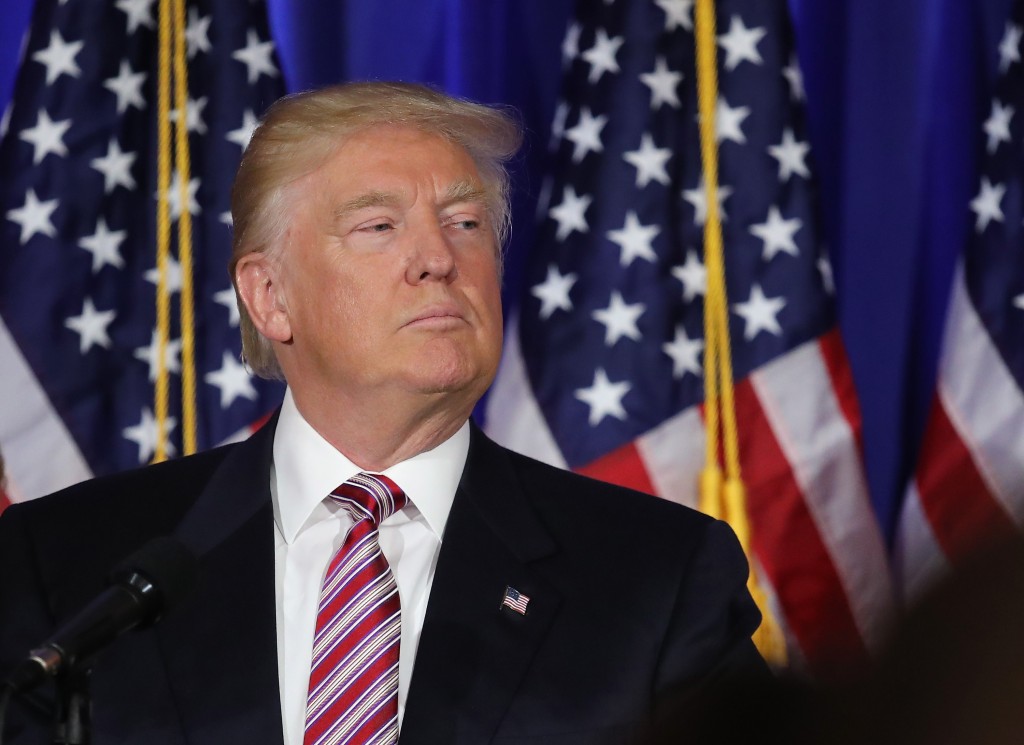 BRIARCLIFF MANOR, NY - JUNE 07: U.S. Republican Presidential candidate Donald Trump addresses supporters and the media following primary elections on June 7, 2016 in Briarcliff Manor, New York. Trump spoke to the media at Trump National Golf Club. John Moore/Getty Images/AFP