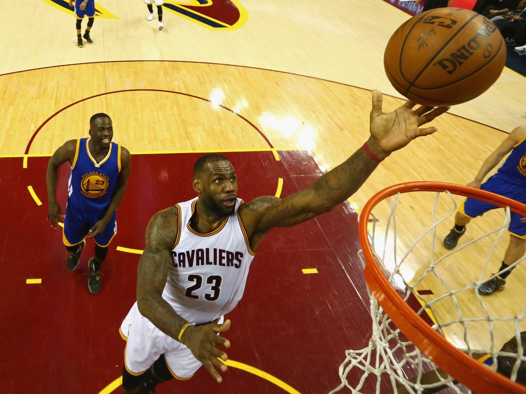 CLEVELAND, OH - JUNE 08: LeBron James #23 of the Cleveland Cavaliers shoots the ball during the second half against the Golden State Warriors in Game 3 of the 2016 NBA Finals at Quicken Loans Arena on June 8, 2016 in Cleveland, Ohio. NOTE TO USER: User expressly acknowledges and agrees that, by downloading and or using this photograph, User is consenting to the terms and conditions of the Getty Images License Agreement.   Ronald Martinez/Getty Images/AFP