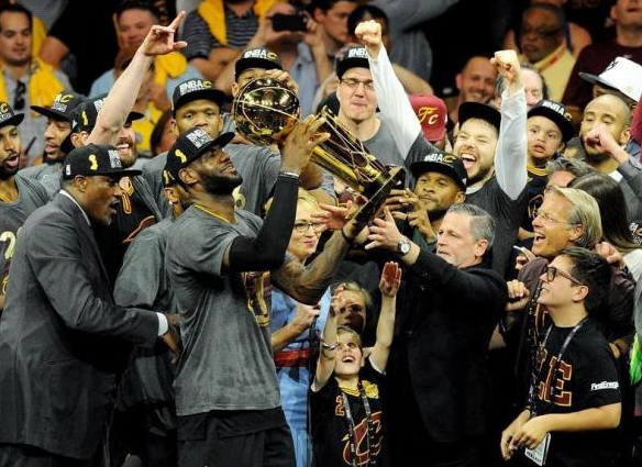  Jun 19, 2016; Oakland, CA, USA; Cleveland Cavaliers forward LeBron James (23) celebratew with the Larry O'Brien Championship Trophy after beating the Golden State Warriors in game seven of the NBA Finals at Oracle Arena. Mandatory Credit: Gary A. Vasquez-USA TODAY Sports 