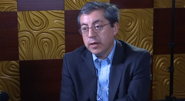 "We think it is not helpful to internationalize the disputes. Related parties should resolve the issue peacefully through bilateral negotiations. We agree with China's long-standing position," said Jose Jara, professor of the Mayor University in Chile. (Photo grabbed from CCTV video)