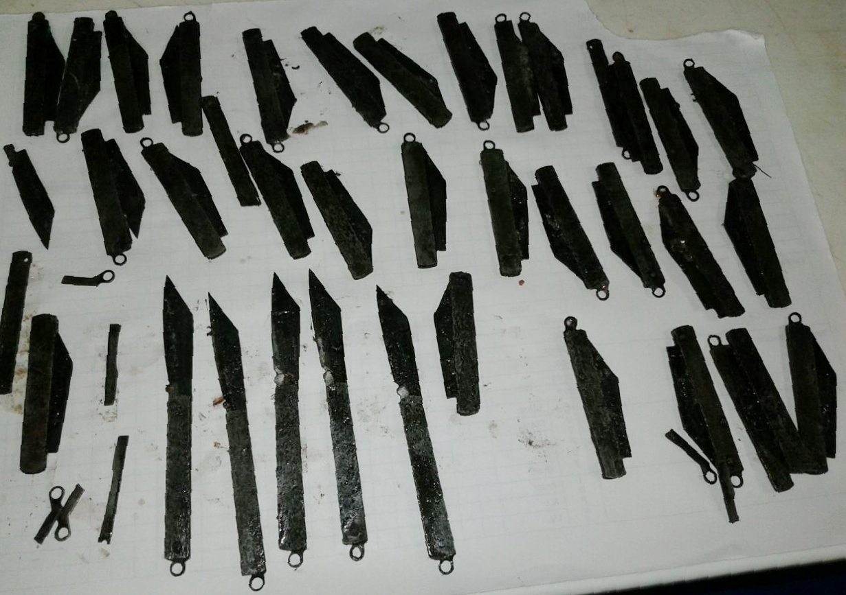 In this handout photograph released by the Corporate Hospital in Amritsar on August 23, 2016, blades recovered following surgery on an Indian policeman who swallowed over 40 knives are seen in Amritsar. An Indian policeman who spent two months swallowing knives and had 40 of them surgically removed said August 23 that "spiritual powers" made him do it. The father of two underwent a successful five-hour operation to remove the knives from his stomach in the northern city of Amritsar after complaining to doctors of severe abdomen pain.  / AFP PHOTO / HO / RESTRICTED TO EDITORIAL USE - MANDATORY CREDIT "AFP PHOTO / THE CORPORATE HOSPITAL" - NO MARKETING NO ADVERTISING CAMPAIGNS - DISTRIBUTED AS A SERVICE TO CLIENTS