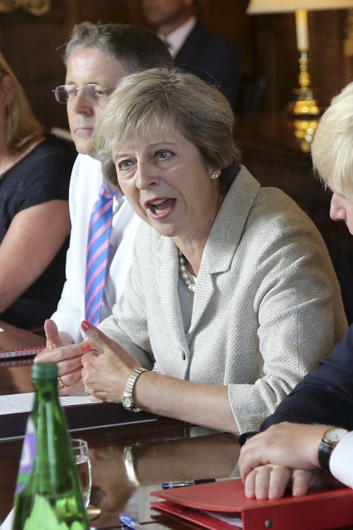 British Prime Minister Theresa May chairs a meeting of the cabinet at the Prime Minister's country retreat Chequers near the village of Ellesborough in Buckinghamshire, northwest of London, on August 31, 2016.  The British prime minister chaired a meeting of the cabinet on August 31 to discuss Brexit and the next steps the government needs to take. Also on the agenda were the economy, social reform and the forthcoming legislative programme ahead of the return of parliament from the summer recess on September 5.  / AFP PHOTO / POOL / Mark Richards