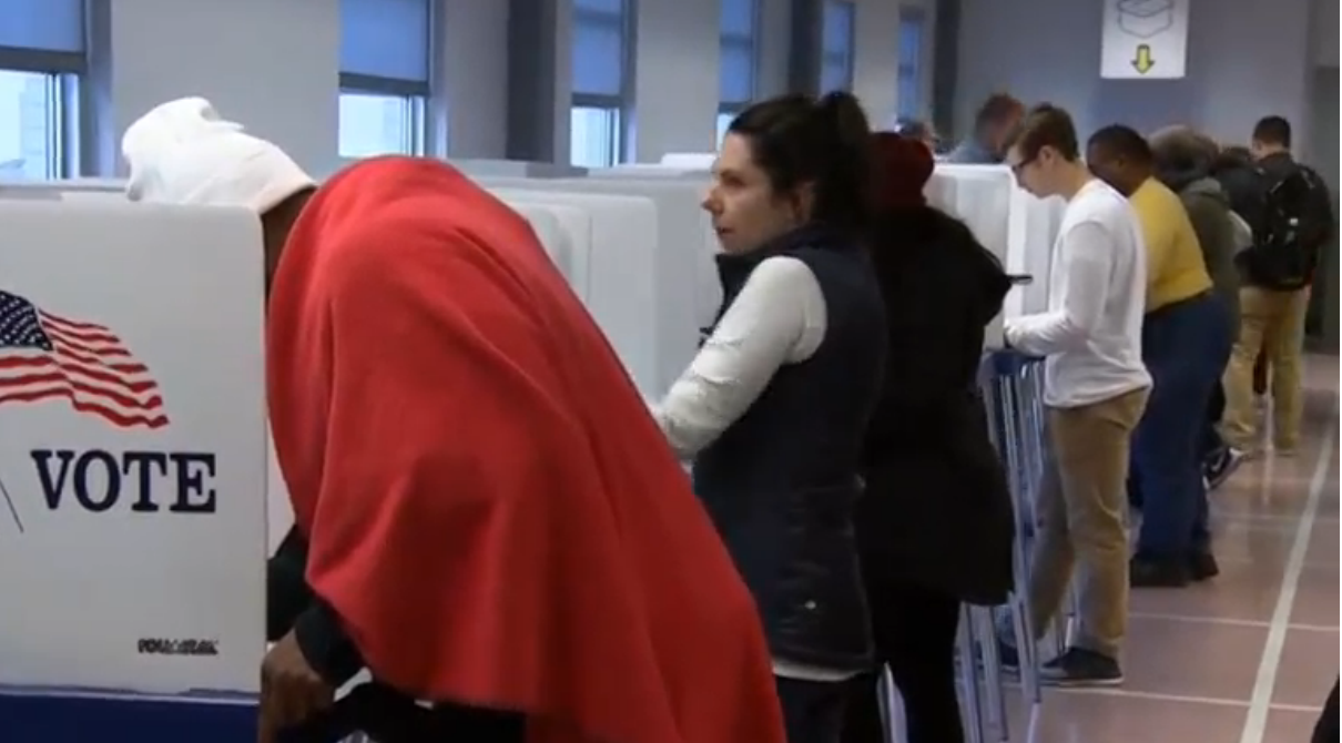 The first ballots were cast in Ohio on Wednesday (October 12) as several states began early voting. (Courtesy Reuters/Photo grabbed from Reuters video)