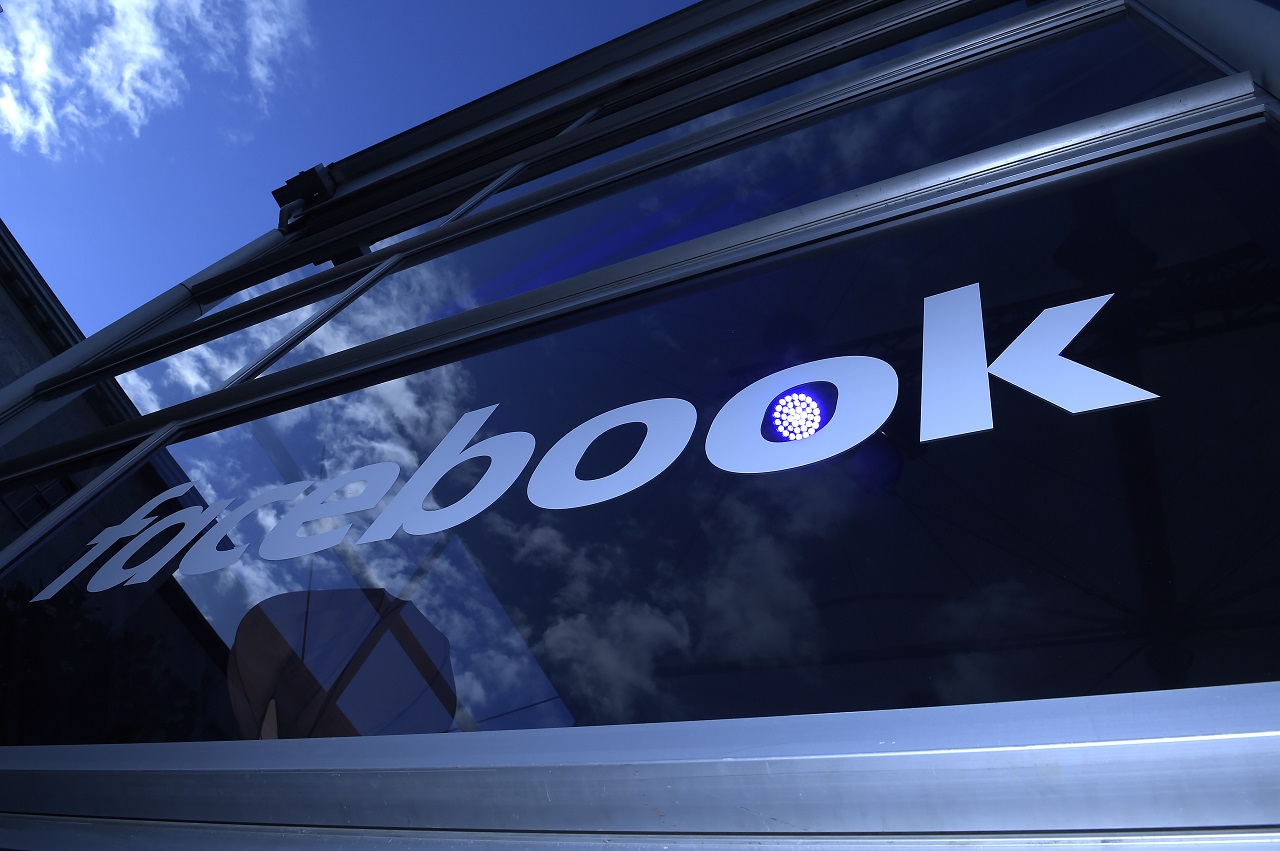 The "Facebook"-logo is pictured on the sidelines of a press preview of the so-called "Facebook Innovation Hub" in Berlin on February 24, 2016. / AFP PHOTO / TOBIAS SCHWARZ