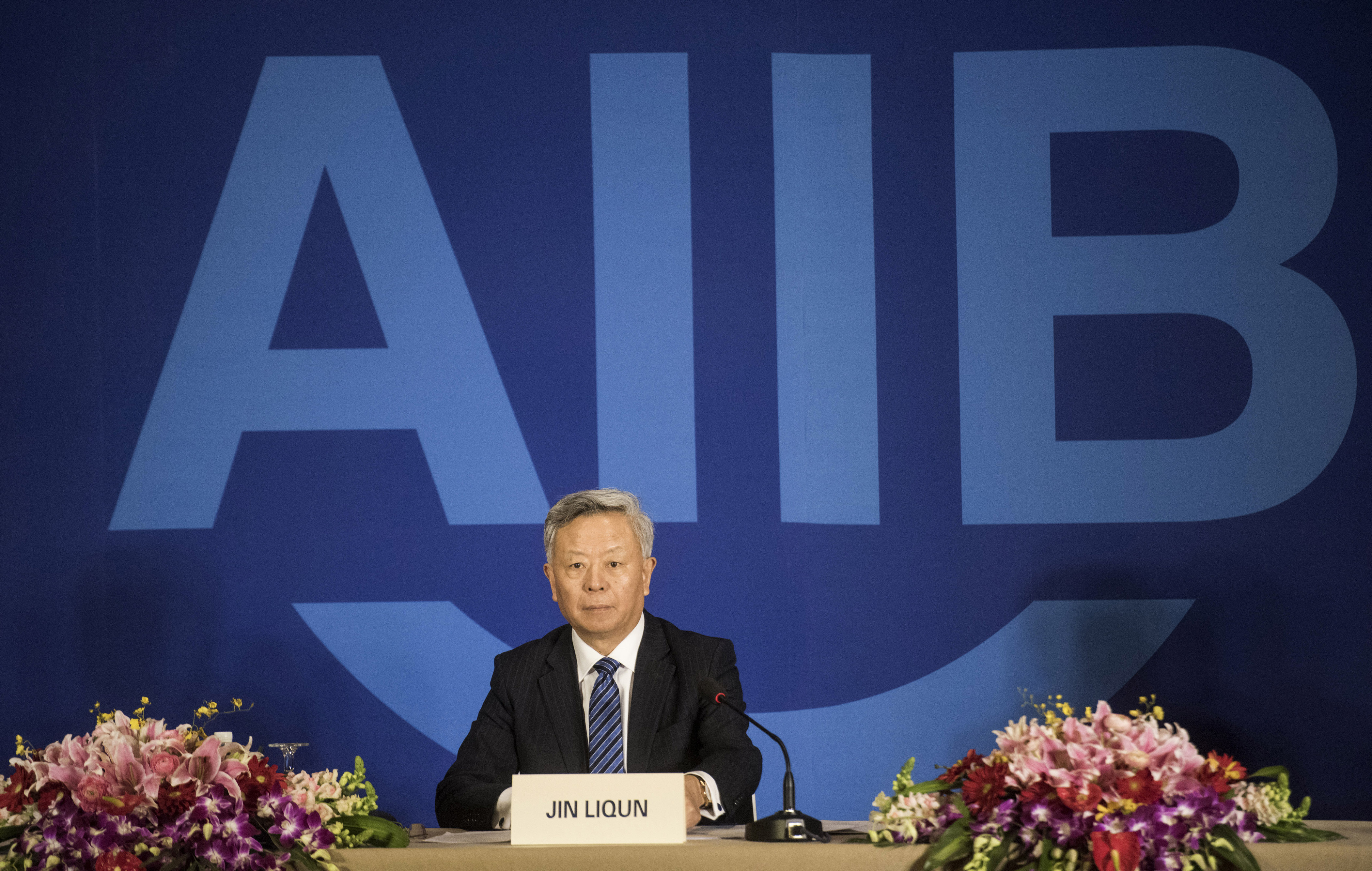 Jin Liqun, the first president of the Asian Infrastructure Investment Bank (AIIB), speaks to journalists during a press conference in Beijing on January 17, 2016.  The new Asian Infrastructure Investment Bank will boost investment in the region while contributing to "fairer" global economic governance, Chinese President Xi Jinping said on January 16 at the formal opening ceremony in Beijing.  The China-backed AIIB -- which has 57 members including major economies such as Australia and South Korea but notably excluding the US and Japan -- is viewed by some as a rival to the World Bank and Asian Development Bank (ADB).     AFP PHOTO / FRED DUFOUR / AFP PHOTO / FRED DUFOUR