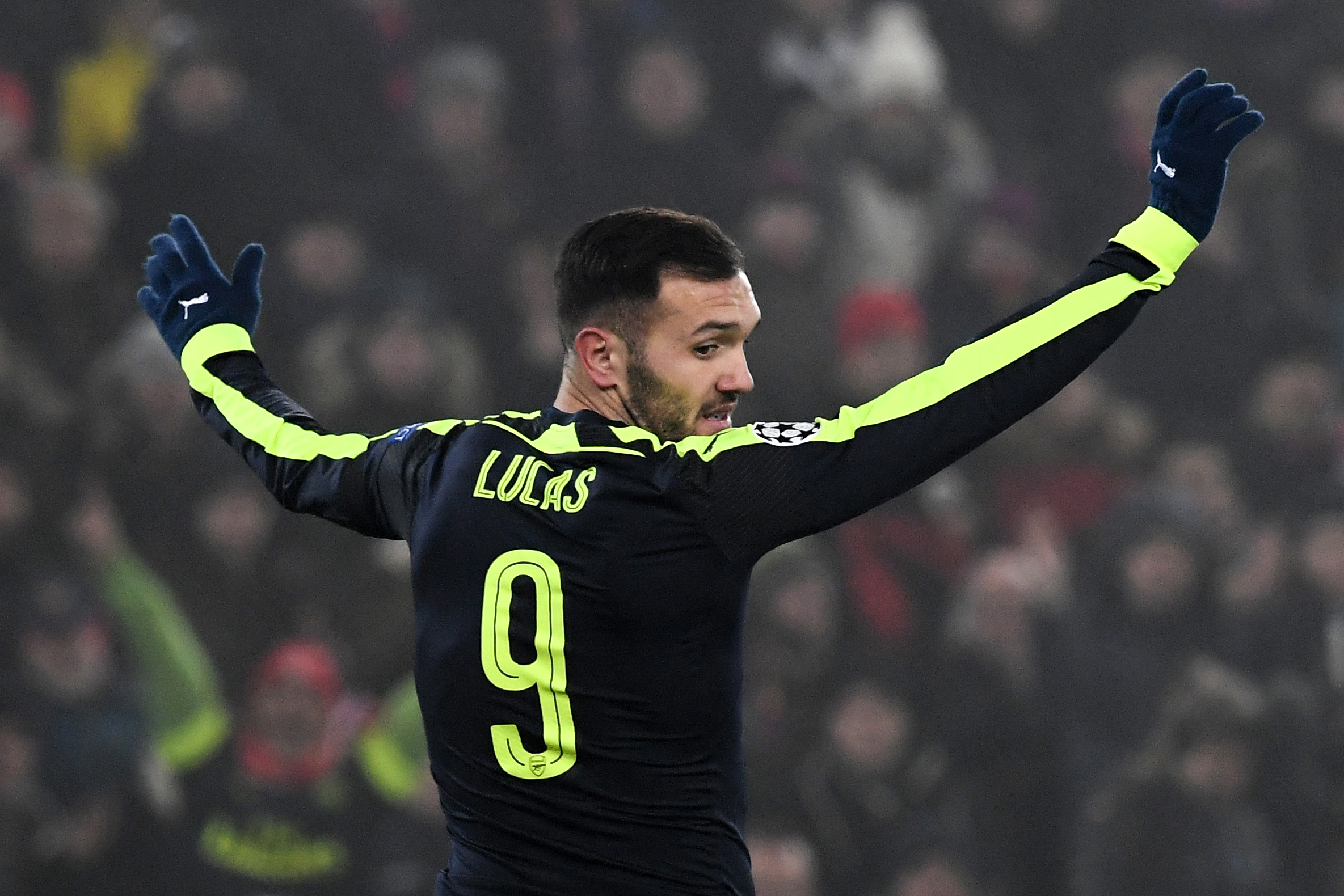 Arsenal's Spanish forward Lucas Perez celebrates after scoring a second goal during the UEFA Champions league Group A football match between FC Basel 1893 and Arsenal FC on December 6, 2016 at the St Jakob Park stadium in Basel. / AFP PHOTO / Patrick HERTZOG