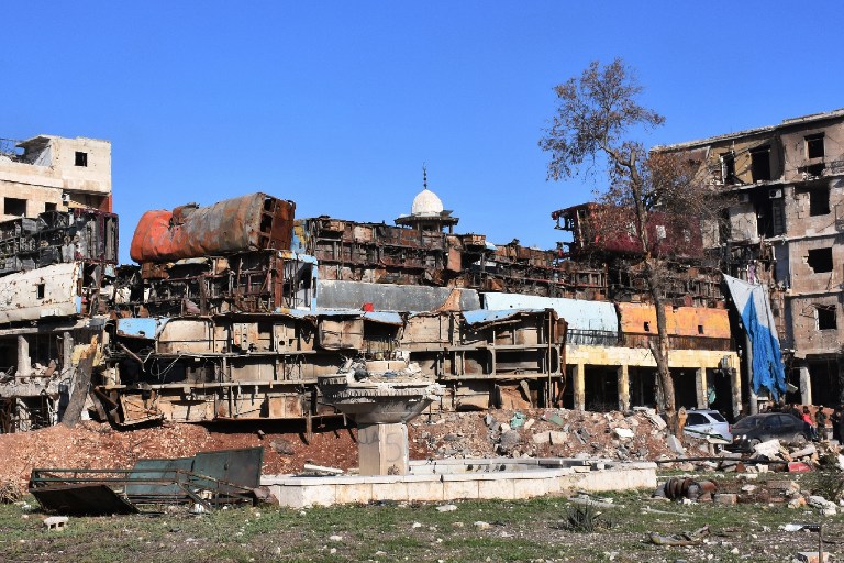 A picture shows a makeshift barricade in the Bab al-Hadid district, in Aleppo's Old City, on December 8, 2016, after it was retaken by Syrian pro-government forces. President Bashar al-Assad said victory for his forces in Aleppo would be a "huge step" in ending Syria's war, as government troops battled to retake more rebel ground. Regime forces have retaken about 80 percent of former rebel territory in Aleppo since launching an all-out offensive three weeks ago to recapture Syria's second city.  / AFP PHOTO / GEORGE OURFALIAN