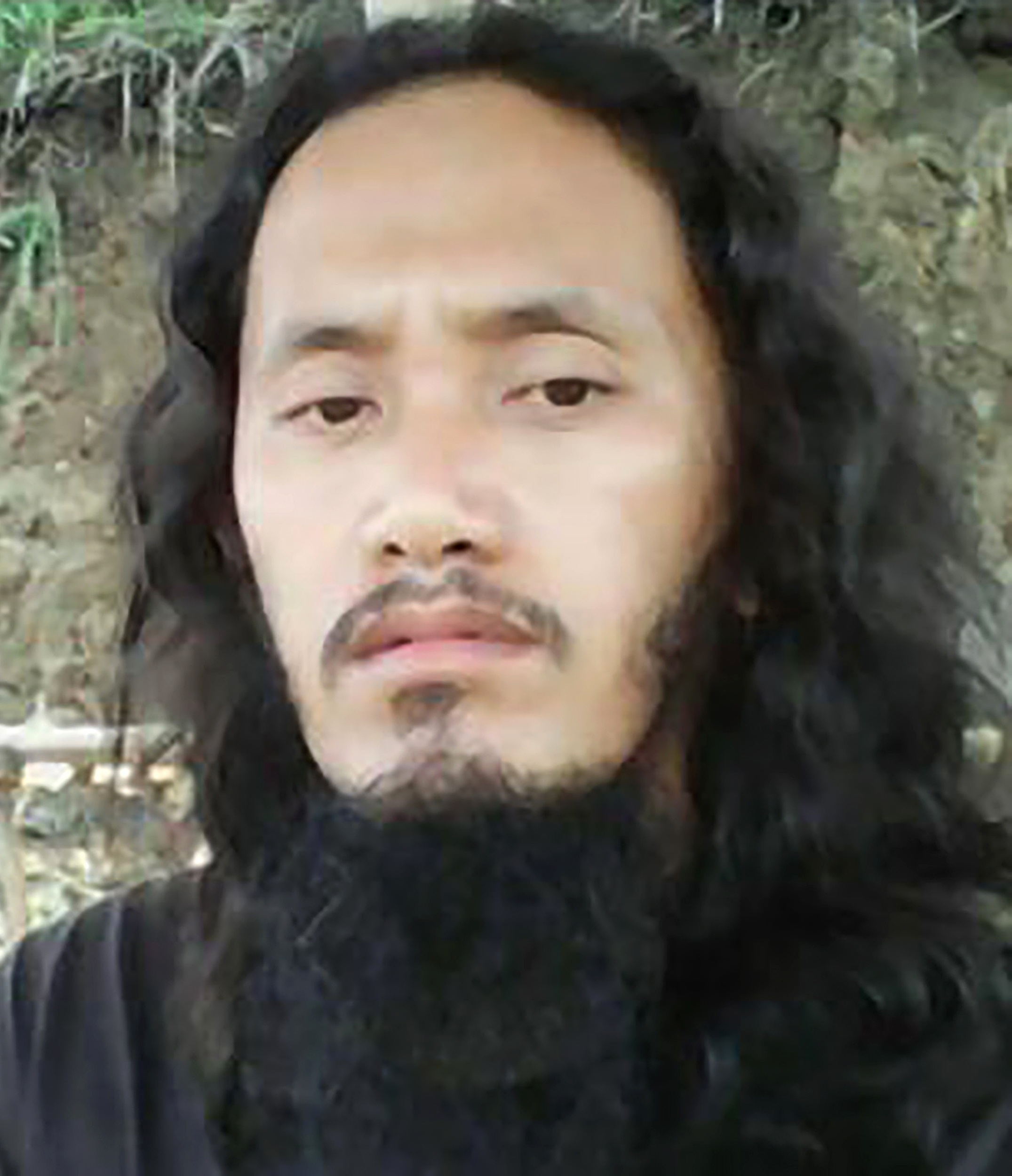 This undated handout photo received from the Philippine National Police on January 5, 2017 shows Mohammad Jaafar Maguid, founder and leader of Ansarul Khilafa Philippines, at an undisclosed location in the Philippines. Maguid, the leader of a Muslim militant group that has carried out deadly attacks on civilians to win support from Islamic State fighters in Iraq and Syria, was killed by Philippine security forces, authorities said on January 5, 2017. / AFP PHOTO / PHILIPPINE NATIONAL POLICE / Handout / -----EDITORS NOTE --- RESTRICTED TO EDITORIAL USE - MANDATORY CREDIT "AFP PHOTO / Philippine National Police" - NO MARKETING - NO ADVERTISING CAMPAIGNS - DISTRIBUTED AS A SERVICE TO CLIENTS