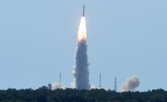 Indian Space Research Organisation's (ISRO) satellite CARTOSAT-2, along with 20 other satellites from the US, Canada, Germany and Indonesia on board the Polar Satellite Launch Vehicle (PSLV-C34), is launched from Sriharikota in the southern state of Andhra Pradesh on June 22, 2016. / AFP PHOTO / ARUN SANKAR