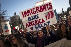 MILWAUKEE, WI - FEBRUARY 13: Protestors gather at the Milwaukee County Courthouse where they attend a rally against President Donald Trumps policy on immigration February 13, 2017 in Milwaukee, Wisconsin. As well groups are calling for a general strike against controversial Milwaukee County Sheriff David Clarke who plans to turn sheriffs into immigration agents.   Darren Hauck/Getty Images/AFP