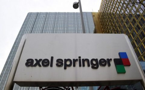 View of the headquarters of German media giant Axel Springer in Berlin on March 3, 2016. Springer forecast muted growth in sales this year, after it accelerated the expansion of its digital business in 2015. / AFP PHOTO / John MACDOUGALL