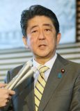 Japanese Prime Minister Shinzo Abe speaks to journalists at his official residence in Tokyo on March 7, 2017, following telephone talks with US President Donald Trump.   The two leaders -- who met in person when Abe visited the United States two weeks ago -- spoke by telephone after North Korea fired off four ballistic missiles in what Pyongyang called a training exercise for a strike on US bases in Japan. / AFP PHOTO / JIJI PRESS / JIJI PRESS / Japan OUT