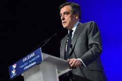 French presidential election candidate for the right-wing Les Republicains (LR) party Francois Fillon delivers a speech during a campaign meeting in Orleans, central France, on March 7, 2017. Embattled French presidential hopeful Francois Fillon received an interest-free, undeclared loan of 50,000 euros ($53,000) from a billionaire friend in 2013, according to the Canard Enchaine weekly. The conservative candidate "did not deem it necessary" to report the loan from Marc Ladreit de Lacharriere to a state transparency watchdog, the weekly said in its edition to appear on March 8. Once the frontrunner to become France's next president in May, he has had to battle to stay in the race because of revelations in January by the Canard Enchaine that he had paid his wife Penelope hundreds of thousands of euros from public funds, allegedly for fake jobs.  / AFP PHOTO / Christophe ARCHAMBAULT