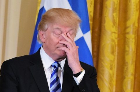 US President Donald Trump listens to a speaker during a Greek Independence Day celebration in the East Room of the White House on March 24, 2017 in Washington, DC. / AFP PHOTO / MANDEL NGAN