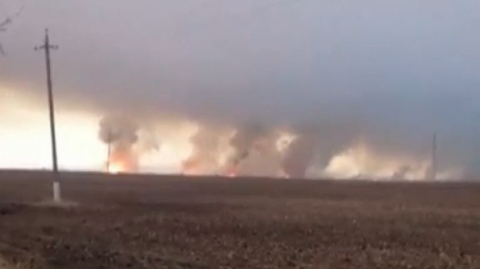 Massive fire erupts at an arms warehouse in east Ukrainian region of Kharkiv.(photo grabbed from Reuters video)