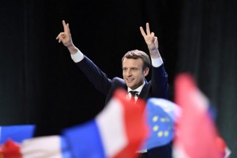 French presidential election candidate for the En Marche ! movement Emmanuel Macron delivers a speech at the Parc des Expositions in Paris, on April 23, 2017, after the first round of the Presidential election. Centrist Emmanuel Macron will face off against far-right Marine Le Pen in the second round of France's presidential election, projections showed Sunday, making him clear favourite to emerge as the country's youngest leader in modern history. / AFP PHOTO / Eric FEFERBERG