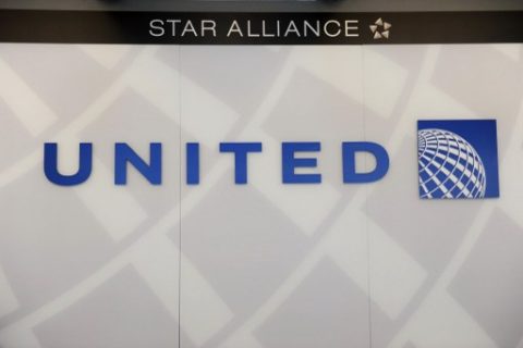 United Airlines on Thursday announced it will offer bumped passengers up to $10,000 in compensation and reduce overbooking following the dragging incident on board one of its flights that caused worldwide outrage./AFP PHOTO.