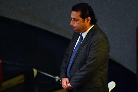 Costa Concordia's captain Francesco Schettino reacts as he arrives at his trial in a local theatre in Grosseto on December 2, 2014. Captain Francesco Schettino, dubbed Italy's "most hated man" by tabloids over the spectacular crash of his cruise ship in 2012 with the loss of 32 lives, went on trial on December 2 charged with manslaughter. AFP PHOTO / GIUSEPPE CACACE / AFP PHOTO / GIUSEPPE CACACE