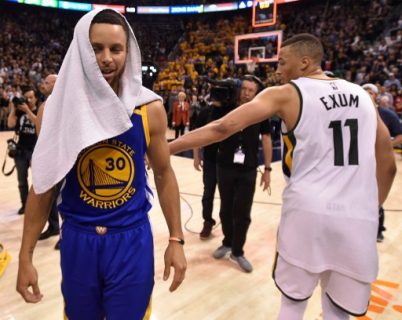 SALT LAKE CITY, UT - MAY 8: Stephen Curry #30 of the Golden State Warriors leaves the court after they beat the Utah Jazz 121-95 in Game Four of the Western Conference Semifinals during the 2017 NBA Playoffs at Vivint Smart Home Arena on May 8, 2017 in Salt Lake City, Utah. Dante Exum #11 of the Utah Jazz acknowledges Curry on the way out. NOTE TO USER: User expressly acknowledges and agrees that, by downloading and or using this photograph, User is consenting to the terms and conditions of the Getty Images License Agreement. Gene Sweeney Jr/Getty Images/AFP