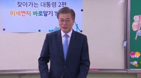 South Korean President Moon Jae-in visited a primary school in Seoul on Monday (May 15) where he announced a new government air pollution policy that includes shutting down coal-fired power plants that are over 30 years old in June to mitigate air pollution.(photo grabbed from Reuters video)