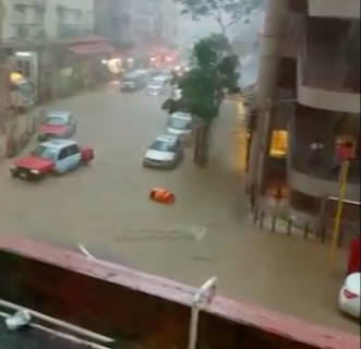 Rainstorm lashed Hong Kong for hours and caused flash flooding and slowed down traffic on Wednesday (May 24). Photo grabbed from Reuters video file.