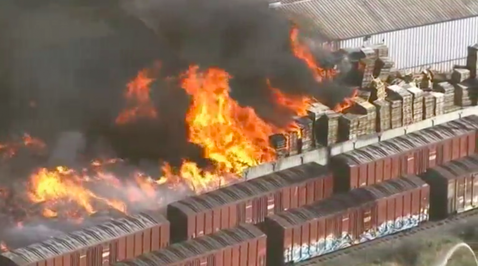 A large fire at a wood pallet yard in Stockton, California, was threatening some homes and gutted several vehicles in a residential neighborhood on Thursday (May 25). Photo grabbed from Reuters video file.