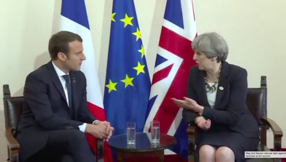 British Prime Minister Theresa May and French President Emmanuel Macron discussed leading the fight against terrorism on Friday (May 26) as they met at this year's Group of Seven (G7) summit, hosted in the chic Sicilian resort town of Taormina. Photo grabbed from Reuters video file.