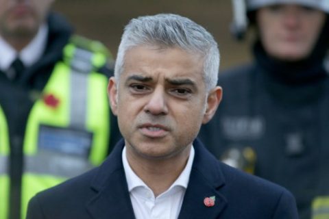 (FILES) This file photo taken on November 09, 2016 shows Mayor of London Sadiq Khan (C) addresses the media as he stands with members of the emergency services during his visit to the scene of a derailed tram, in Croydon, south London, on November 9, 2016. Donald Trump lashed out Sunday at London's mayor Sadiq Khan, accusing him of downplaying the threat of terrorism a day after knife-wielding men mowed down and stabbed revelers in the British capital. London's mayor swiftly shot down the US president's remarks, made in a series of overnight tweets, as critics accused Trump of exploiting a terror attack for political gain -- and not for the first time. / AFP PHOTO / DANIEL LEAL-OLIVAS