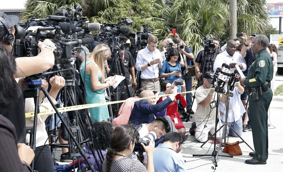 Orange County Sheriff Jerry L. Demings briefs the media at the scene of a shooting in Orlando, Florida on June 5, 2017. A man who had been fired in April from his job at a Florida company opened fire June 5, 2017 at the Orlando-area business, killing five people before taking his own life, authorities said. Four people were killed at the scene, while a fifth died at the hospital, Orange County Sheriff Jerry Demings told reporters. Demings said the incident was being treated as a "workplace violence incident" and did not appear to have any links to terror. / AFP PHOTO / Gregg Newton