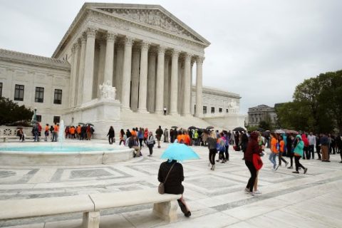 (FILES) This file photo taken on April 18, 2017 shows people at the US Supreme Court, in Washington, DC. Do American authorities have the right to track a citizen via cell phone step by step, month after month? The US Supreme Court announced on June 5, 2017 that it would consider the issue for the first time, pitting fundamental freedoms against the needs of police probes. The nation's top court will take up a sensitive case on privacy rights that will determine the extent of law enforcement access to cell phone location records. / AFP PHOTO / GETTY IMAGES NORTH AMERICA / MARK WILSON