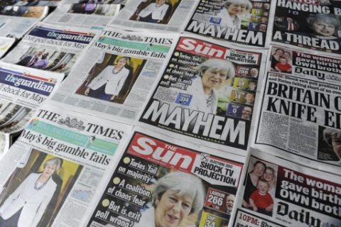 An arrangement of British daily newspapers are photographed as an illustration in London on June 9, 2017 showing front page stories about the exit poll results of the snap general election. British Prime Minister Theresa May faced pressure to resign on June 9 after losing her parliamentary majority, plunging the country into uncertainty as Brexit talks loom. The pound fell sharply amid fears the Conservative leader will be unable to form a government and could even be forced out of office after a troubled campaign overshadowed by two terror attacks. / AFP PHOTO / DANIEL SORABJI