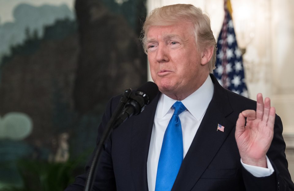 US President Donald Trump delivers a statement in the Diplomatic Room at the White House in Washington, DC, on June 14, 2017 after House Majority Whip Steve Scalise was shot in nearby Alexandria, Virginia. The man who opened fire on Republican lawmakers at a baseball practice early Wednesday, wounding a top congressman and three others, has died of injuries sustained in a shootout with police, President Donald Trump said. "Many lives would have been lost, if not for the heroic actions of the two Capitol police officers who took down the gunman despite sustaining gunshot wounds during a very, very brutal assault," Trump said in remarks to the nation. / AFP PHOTO / NICHOLAS KAMM