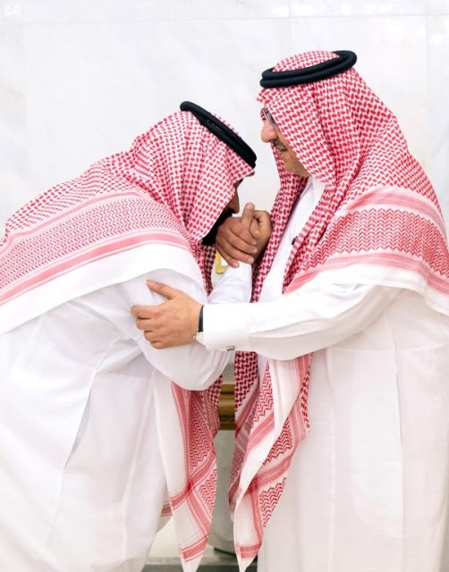 A handout photo made available by the Saudi press Agency (SPA) on June 21, 2017, shows Saudi Arabia's former Crown Prince and Interior Minister Mohammed bin Nayef (R) pledging his allegiance to his successor newly appointed Crown Prince Mohammed bin Salman, at the Royal Palace in Mecca. Saudi Arabia's King Salman ousted his nephew as crown prince and installed his son Mohammed bin Salman, capping a meteoric rise for the 31-year-old that puts him one step from the throne. / AFP PHOTO / SPA / HO / RESTRICTED TO EDITORIAL USE - MANDATORY CREDIT "AFP PHOTO / BANDAR AL-JALOUD/ SPAE" - NO MARKETING NO ADVERTISING CAMPAIGNS - DISTRIBUTED AS A SERVICE TO CLIENTS