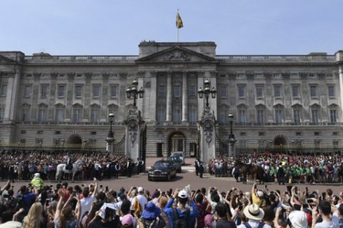 Britain's Queen Elizabeth II leaves driven in the Royal Bentley car from Buckingham Palace in London on June 21, 2017 headed for the Houses of Parliament for the State Opening of Parliament ceremony. Queen Elizabeth II will formally open parliament and announce the British government's legislative programme on Wednesday, two days later than planned. The state opening, a ceremony full of pomp in which the monarch reads out the Queen's Speech detailing the government's programme for the coming year, was due to take place on June 19, but was delayed after Britain's Prime Minister Theresa May's Conservative party lost their majority in the House of Commons in the June 8 election. / AFP PHOTO / Paul ELLIS