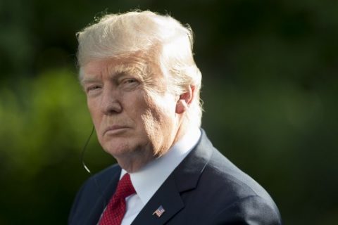 US President Donald Trump listens as Indian Prime Minister Narendra Modi addresses a joint press conference in the Rose Garden at The White House in Washington D.C on June 26, 2017. US President Donald Trump is hosting Indian Prime Minister Narendra Modi for a first face-to-face meeting, seeking to forge a chemistry that can add new fizz to a flourishing relationship between the world's two largest democracies. / AFP PHOTO / SAUL LOEB