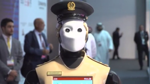  A robotic policeman which can help identify wanted criminals and collect evidence has joined Dubai's police force and will patrol busy areas in the city, as part of a government programme aimed at replacing some human crime-fighters with machines.(photo grabbed from Reuters video)