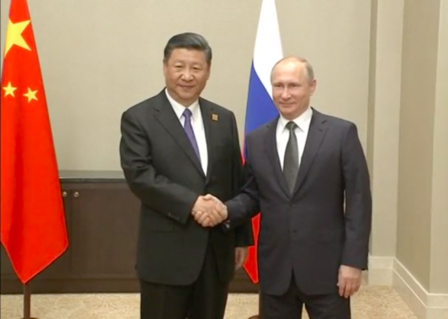 Chinese President Xi Jinping and his Russian counterpart, Vladimir Putin, pledged in the Kazakh capital of Astana on Thursday to enhance bilateral ties and promote the role of the Shanghai Cooperation Organization (SCO). Photo grabbed from Reuters video file.