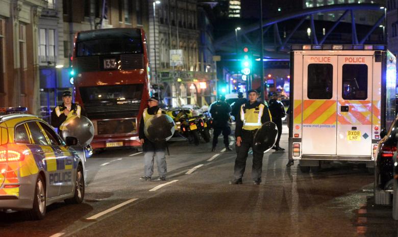 Police attend to an incident on London Bridge in London, Britain, June 3, 2017. Reuters / Hannah McKay